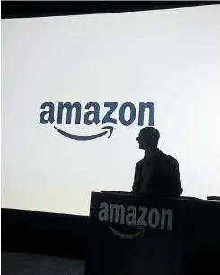  ?? Picture: Getty Images ?? Will Jeff Bezos’s Amazon be a fit with the Whole Foods culture?