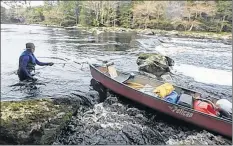  ??  ?? Four canoes, eight women, as they paddle through Canaan in the rain, grateful that the winds have died down.