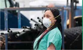  ?? Photograph: Lev Radin/ Pacific Press/Rex/Shuttersto­ck ?? A nurse from Alaska listens as Mayor Bill De Blasio greets health care workers who came from different parts of America to help with Covid-19 outbreak.