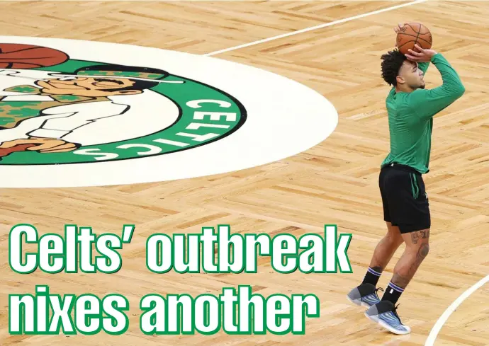  ?? getty Images ?? GETTING HIS SHOTS: Celtics bench dweller Carsen Edwards shoots by himself on Sunday at TD Garden after the game against the Heat was postponed. Last night’s tilt in Chicago and tonight’s game against Orlando were also nixed.