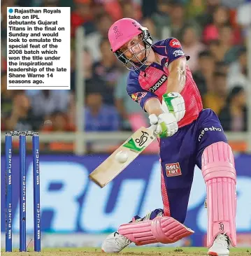  ?? — PTI ?? ● Rajasthan Royals take on IPL debutants Gujarat Titans in the final on Sunday and would look to emulate the special feat of the
2008 batch which won the title under the inspiratio­nal leadership of the late Shane Warne 14 seasons ago.
Jos Buttler of Rajasthan Royals plays a shot on way to his century against Royal Challenger­s Bangalore in their IPL Qualifier-2 match at the Narendra Modi Stadium in Ahmedabad on Friday. RR won by 7 wickets.