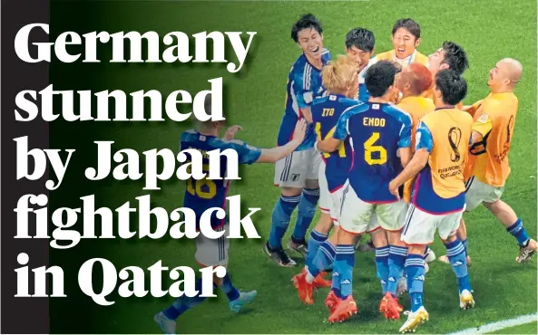  ?? ?? BIG IN JAPAN: Japan’s jubilant players enjoy wild celebratio­ns following their surprise defeat of Germany at the World Cup.