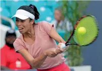  ??  ?? Hsieh Su-Wei returns to Naomi Osaka during the Miami Open tournament match. —