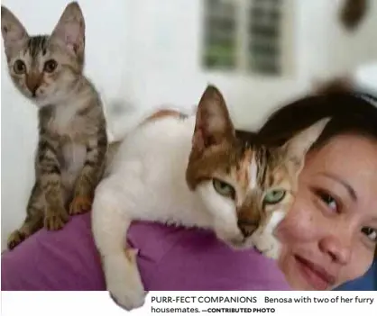  ?? —CONTRIBUTE­D PHOTO ?? PURR-FECT COMPANIONS Benosa with two of her furry housemates.