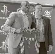  ?? Karen Warren / Houston Chronicle ?? After signing with the Rockets on Thursday, P.J. Tucker, left, was praised by GM Daryl Morey as bringing the toughness and defense the team needs.