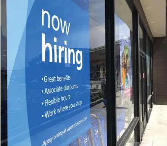  ?? GETTY IMAGES ?? FOR HIRE: A now hiring sign is pictured last April 2 in San Rafael, Calif. Employers' biggest challenge right now hiring and employee retention.