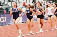  ?? UConn Athletics / Contribute­d photo ?? Mia Nahom, left, broke the school record in the women’s 5000 meters with a time of 16 minutes, 35 seconds in April.