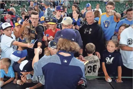  ?? MORRY GASH/AP ?? Brewers reliever Josh Hader was cheered by fans in Milwaukee when he returned after the All-Star Game.