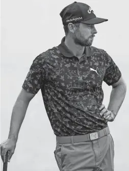  ?? ERIC GAY/AP ?? Adam Svensson waits to putt on the 18th hole during the second round of the Players Championsh­ip on Friday in Ponte Vedra Beach, Fla.