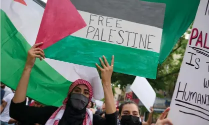  ??  ?? People rally in Queens, New York, in solidarity with Palestine after the recent attacks on residents in Sheikh Jarrah. Photograph: Edna Leshowitz/Zuma Wire/Rex/Shuttersto­ck