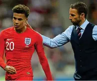 ?? GETTY IMAGES ?? Support: Southgate comforts Alli (left)