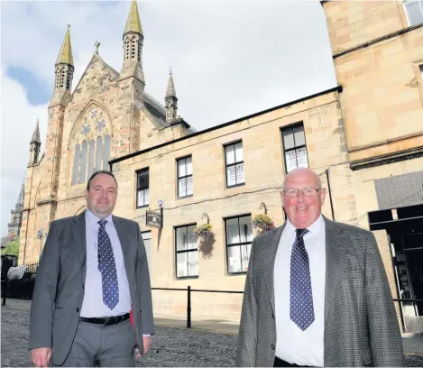  ??  ?? Moving forward Graeme McGowan chairman of the Wynd Centre, and manager Ian Young