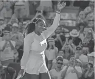  ??  ?? Serena Williams celebrates Monday after her first-round Wimbledon victory over Arantxa Rus in. Williams won 7-5, 6-3. SUSAN MULLANE/USA TODAY