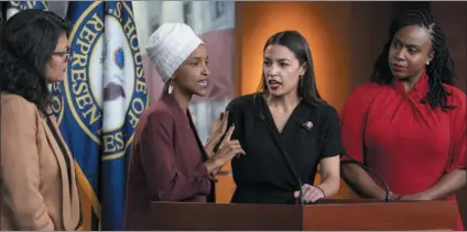  ?? J. SCOTT APPLEWHITE - ASSOCIATED PRESS ?? From left, Rep. Rashida Tlaib, D-Mich., Rep. Ilhan Omar, D-Minn., Rep. Alexandria Ocasio-Cortez, D-N.Y., and Rep. Ayanna Pressley, D-Mass., respond to remarks by President Donald Trump after his call for the four Democratic congresswo­men to go back to their “broken” countries, during a news conference at the Capitol in Washington, Monday, July 15, 2019. All are American citizens and three of the four were born in the U.S.