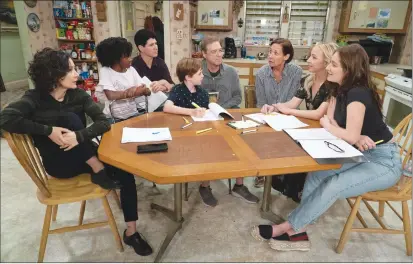  ?? Associated Press photo ?? This image released by ABC shows, from left, Sara Gilbert, Jayden Rey, Michael Fishman, Ames McNamara, John Goodman, Laurie Metcalf, Lecy Goranson and Emma Kenney in a scene from “The Connors,” premiering Oct. 16.
