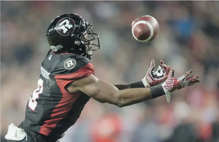  ?? — THE CANADIAN PRESS FILES ?? Ottawa Redblacks wide receiver Ernest Jackson catches what turned out to be the winning touchdown during Sunday’s overtime Grey Cup thriller.