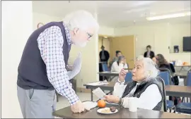  ?? MARCIO JOSE SANCHEZ — THE ASSOCIATED PRESS ?? Patrick Arbore, left, talks to Corazon Leano as he conducts an anti-bullying class in April at the 30th Street Senior Center in San Francisco.