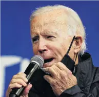  ?? PHOTO: REUTERS ?? Facing up . . . US Democratic presidenti­al candidate Joe Biden takes down his mask as he speaks during a campaign event in Philadelph­ia on Sunday.