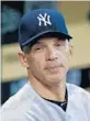  ?? SCOTT HALLERAN/GETTY ?? Yankees manager Joe Girardi says changing rules to allow pitchless intentiona­l walks isn’t a big deal.