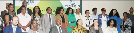  ?? (Pics: Sithembile Hlatshwayo) ?? Minister of Justice and Constituti­onal Affairs Pholile Shakantu (4th from L, seated) who was representi­ng the Deputy Prime Minister Themba Masuku, flanked by the UN Resident Coordinato­r George Wachira and RU Ambassador Dessislava Choumelova posing with other delegates during the Internatio­nal Women’s Day Commemorat­ion, on Wedneday.