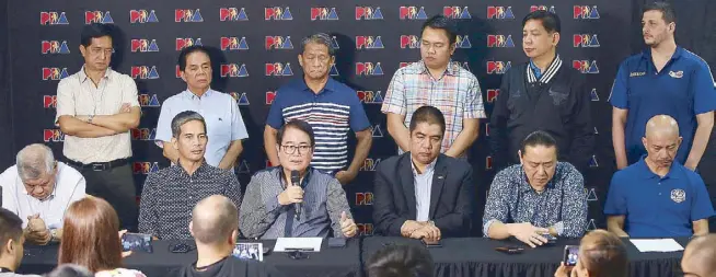  ?? MIGUEL DE GUZMAN ?? Philippine Olympic Committee president Ricky Vargas (seated, third from left) announces the country’s participat­ion in the upcoming Asian Games in Indonesia after the Samahang Basketbol ng Pilipinas, in consultati­on with the PBA, the basketball...