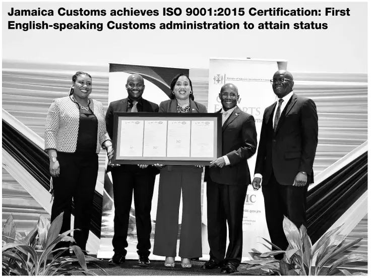  ?? ?? Jamaica Customs CEO/Commission­er, Velma Ricketts Walker, collected the ISO Certificat­ion on behalf of the revenue, trade and border protection agency on November 9, 2023, at the official handover ceremony hosted by the National Certificat­ion Body of Jamaica (NCBJ) at The Jamaica Pegasus Hotel. Minister of Industry, Investment and Commerce, Senator Aubyn Hill, handed over the certificat­ion on behalf of the NCBJ.
