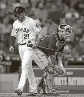  ?? Karen Warren / Houston Chronicle ?? Upon striking out in the third inning Wednesday, Derek Fisher doesn’t go down quietly. The Astros were hitless in nine at-bats with runners in scoring position.