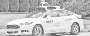  ??  ?? The fatal accident in Arizona, involving a self-driving vehicle operated by ride-sharing giant Uber, has raised concerns that the driverless car industry may be moving too fast. — Uber photo