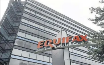  ?? Mike Stewart Associated Press ?? EQUIFAX says a third-party vendor’s code on its website “was serving malicious content” and was removed.