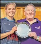  ?? Photo: Neil Paterson. ?? Badenoch’s Kirsty Deans received the Player of the Match award from Peter Gow.