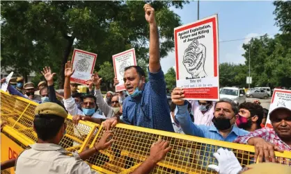  ??  ?? Journalist­s protest in New Delhi over the treatment of their colleagues. Photograph: Sanchit Khanna/Getty Images