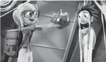  ??  ?? Sam (Anna Faris) holds Barry for Flint (Bill Hader) in Sony Pictures Animation’s new film Cloudy with a Chance of Meatballs 2.