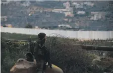 ?? Reuters ?? An Israeli soldier near the border with Lebanon