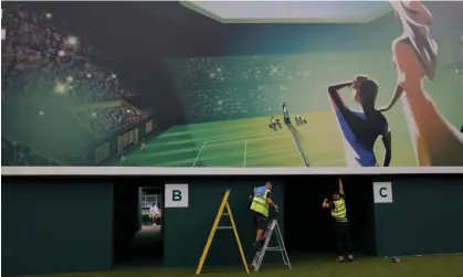  ?? Photograph: Tom Jenkins/The Guardian ?? Workers prepare the back of a stand on court 12 at Wimbledon, close to the new quiet room whereguest­s can ‘escape the crowds around the grounds’.