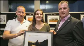  ??  ?? Pat Somers (left), winner of the Fleeting Moments category, and Isabel Auld, winner of the Summer nights category, with board members Philip Wallace and Michael Whelan.