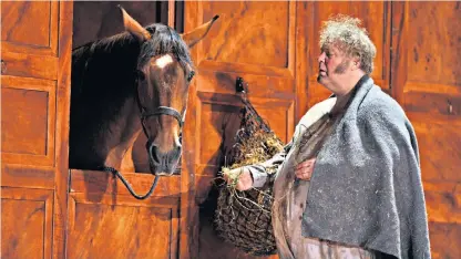  ??  ?? Jolly good fellow: Bryn Terfel as Sir John Falstaff in the 2018 production directed by Robert Carsen at the Royal Opera House in London and, below, a 1906 painting of Falstaff by Eduard von Grützner