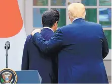  ?? MANUEL BALCE CENETA/ASSOCIATED PRESS ?? President Donald Trump, right, and Japanese Prime Minister Shinzo Abe walk back toward the Oval Office following a news conference in the Rose Garden at the White House in Washington Thursday.