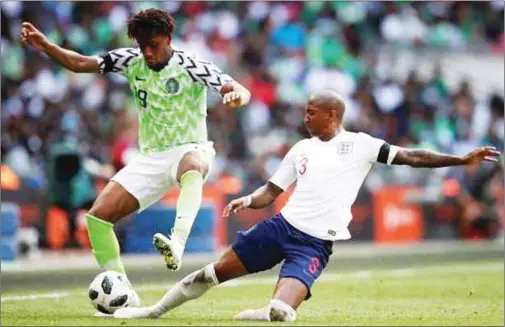  ??  ?? Iwobi (left) scored Nigeria’s first ever goal against England