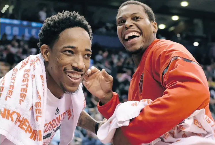  ?? FRANK GUNN / THE CANADIAN PRESS ?? Toronto Raptors stars DeMar DeRozan, left, and Kyle Lowry have become fast friends. For the third straight year they will head to the NBA All-Star Game together.