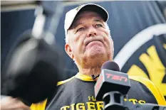  ?? AARON LYNETT/THE CANADIAN PRESS ?? Hamilton Tiger-Cats head coach June Jones speaks to reporters after a practice in Hamilton on Tuesday. Jones called the team’s hiring and firing of Art Briles “an emotional thing.”