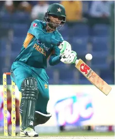  ?? — AFP photo ?? Pakistan batsman Fakhar Zaman plays a shot during the first Twenty20 cricket match between Australia and Pakistan at Sheikh Zayed Stadium in Abu Dhabi.