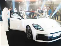  ?? ?? The attendees are exploring the new all-new Panamera.