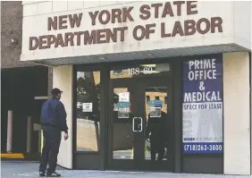  ?? ANTHONY BEHAR/SIPA USA FILES ?? Although businesses have reopened in many U.S. states after COVID-19 shutdowns, numerous companies are cutting jobs at nearly the same pace as others are hiring.