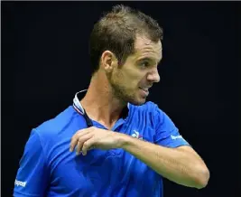  ?? Richard Gasquet n’a rien pu faire face à Marin Cilic, vainqueur en  sets.(Photos AFP) ??