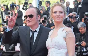  ??  ?? Quentin Tarantino has had to answer accusation­s that he pushed Uma Thurman to her limits for his “Kill Bill” saga. 2014 PHOTO BY LOIC VENANCE/AFP/GETTY IMAGES