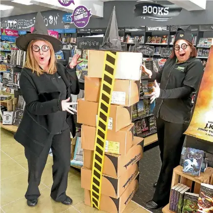  ??  ?? Sandra Ogilvie and Helena Harvey cannot open boxes of the new Harry Potter book until 11.01am on Sunday.