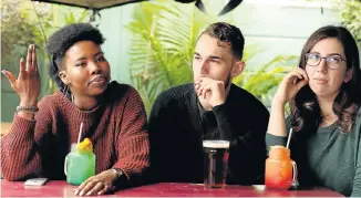  ?? Picture: FREDLIN ADRIAAN ?? TOUGH TIMES: Namhla Mhambi, 22, left, Fabio de Odorico, 19, and Emily Swanepoel, 20, ponder the increased sin taxes announced in the budget speech