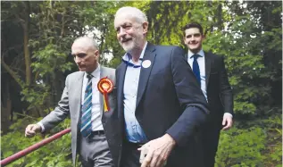  ?? (Hannah McKay/Reuters) ?? LABOUR LEADER Jeremy Corbyn arrives with local Labour candidate Chris Williamson (left) to an election campaign event in Derby in 2017.