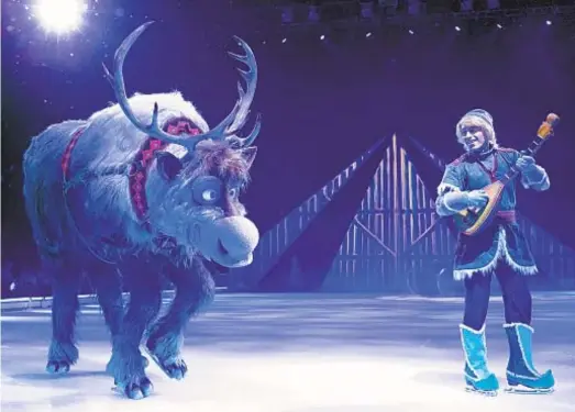  ?? CAITLIN OCHS ?? Sven the reindeer and Kristoff (above) and the character of Mirabel Madrigal (left) in “Disney on Ice Presents Frozen & Encanto,” playing Jan. 18-21 at Pechanga Arena in San Diego.