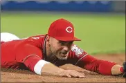  ?? DAVID JABLONSKI / STAFF ?? NL MVP finalist Joey Votto worked hard to improve his defense. “I was very scared I was starting the process of declining as a player,” Votto said.